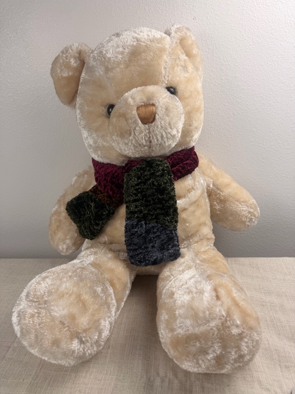 Plush Beige Teddy Bear with Multicolor Scarf